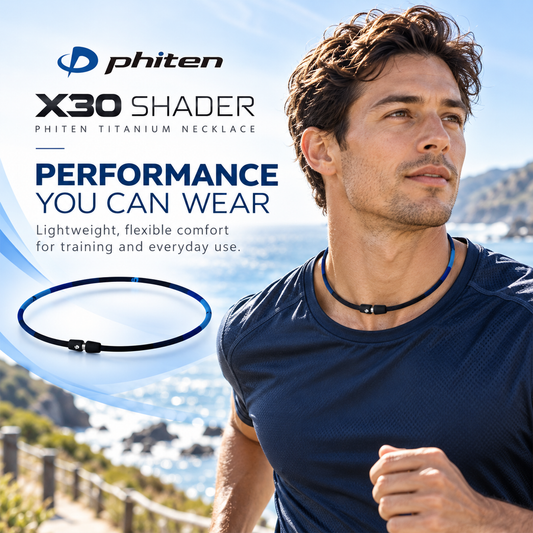 Man wearing the X30 Shader Phiten titanium necklace while running by the ocean